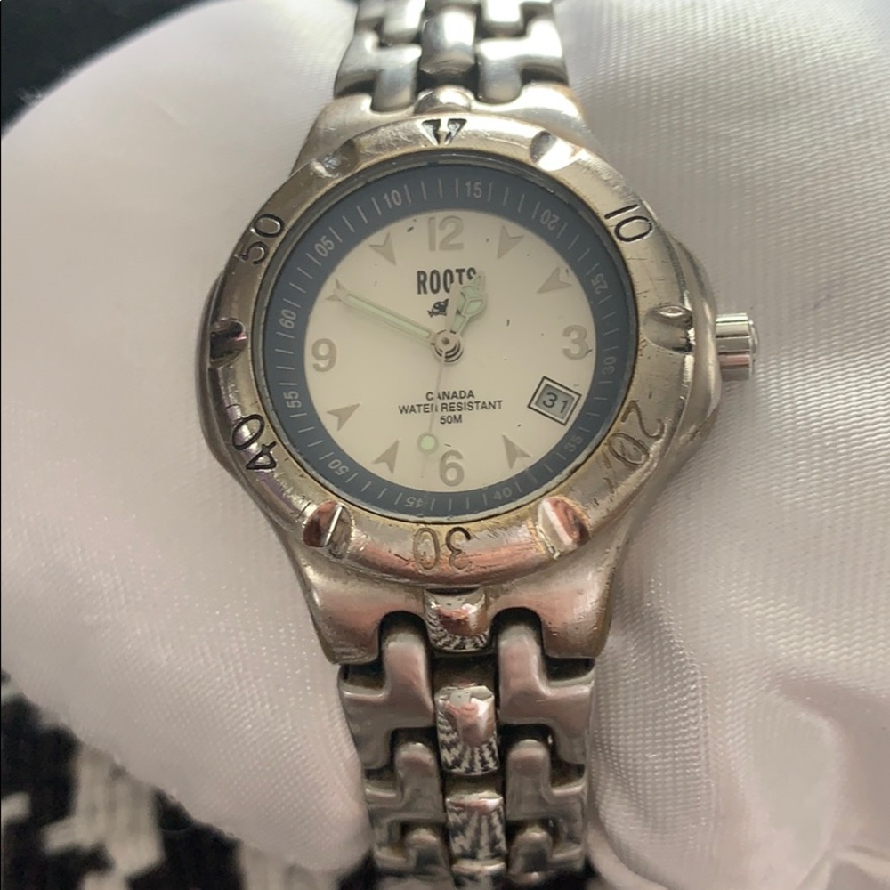 Roots small stainless steel watch